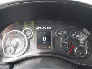 2019 Ram 1500 Big Horn/Lone Star with VIN 1C6SRFFT7KN663677, listed as a IAAI auction lot 40325088 with 77,035 mi miles. Bid and sale history available at carsss.com. Image 7.