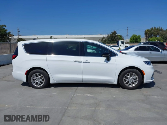 2024 Chrysler Pacifica Touring with VIN 2C4RC1FG7RR194974, listed as a IAAI auction lot 42459547 with 13,200 mi miles and . Bid and sale history available at DreamBid. Image 13.