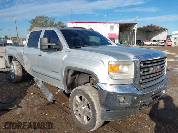 2015 GMC Sierra 2500HD available WiFi SLT with VIN 1GT12ZEG7FF167096, listed as a IAAI auction lot 41408317 with 152,969 mi miles. Bid and sale history available at carsss.com. Image 1.