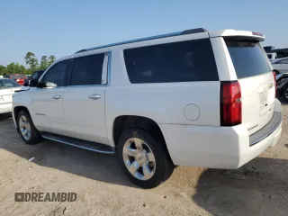 2017 Chevrolet Suburban Premier with VIN 1GNSCJKCXHR348044, listed as a Copart auction lot 55957535 with 112,131 mi miles and Salvage title. Bid and sale history available at DreamBid. Image 2.