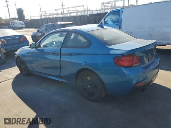 2021 BMW 2 Series M240i with VIN WBA2J5C04M7G65009, listed as a Copart auction lot 81797974 with 40,948 mi miles and Salvage Title. Bid and sale history available at carsss.com. Image 2.