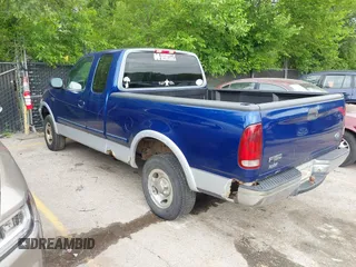 1997 Ford F-150 XL with VIN 1FTDX1866VKA77253, listed as a IAAI auction lot 42448287 with 122,540 mi miles and . Bid and sale history available at DreamBid. Image 3.