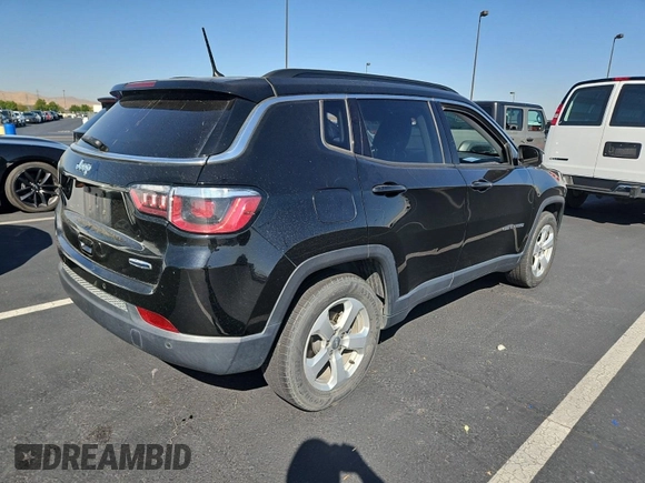 2018 Jeep Compass Latitude with VIN 3C4NJCBB3JT267351, listed as a IAAI auction lot 42715580 with 153,508 mi miles and . Bid and sale history available at DreamBid. Image 4.