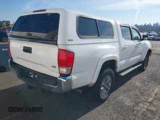 2017 Toyota Tacoma SR5 with VIN 3TMAZ5CN3HM045330, listed as a IAAI auction lot 41371012 with 20,170 mi miles and . Bid and sale history available at DreamBid. Image 4.