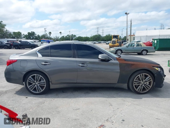 2015 Infiniti Q50 Premium with VIN JN1BV7AP8FM352195, listed as a IAAI auction lot 41968813 with 146,542 mi miles. Bid and sale history available at carsss.com. Image 13.