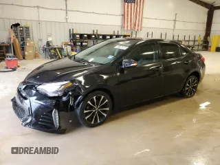 2019 Toyota Corolla L z VIN 5YFBURHE3KP906802, wystawiony jako Copart lot #41758285 z przebiegiem 136 313 mil mil oraz Czysty tytuł • Clean title. Historia ofert i sprzedaży dostępna na DreamBid. Obrazek 1.
