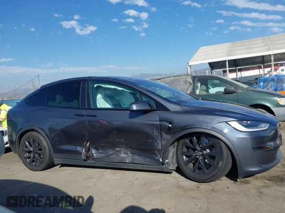 2023 Tesla Model X with VIN 7SAXCBE50PF378548, listed as a IAAI auction lot 41698357 with Not Provided miles and . Bid and sale history available at DreamBid. Image 13.