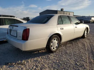 2001 Cadillac DeVille DHS z VIN 1G6KE57Y31U229255, wystawiony jako Copart lot #75101214 z przebiegiem 141 187 mil mil oraz Czysty tytuł • Clean title. Historia ofert i sprzedaży dostępna na DreamBid. Obrazek 3.