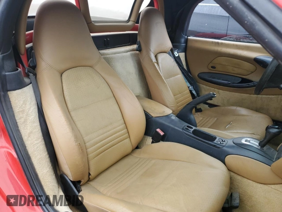 1999 Porsche Boxster z VIN WP0CA2981XU625007, wystawiony jako Copart lot #53751295 z przebiegiem 93 384 mil mil oraz Czysty tytuł • Clean title. Historia ofert i sprzedaży dostępna na DreamBid. Obrazek 10.