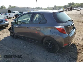2013 Toyota Yaris L with VIN JTDJTUD39DD561836, listed as a Copart auction lot 69000494 with 63,780 mi miles and Salvage Title. Bid and sale history available at carsss.com. Image 2.
