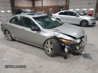 2010 Acura TSX with VIN JH4CU4F48AC000586, listed as a IAAI auction lot 42029688 with 185,143 mi miles. Bid and sale history available at carsss.com. Image 1.