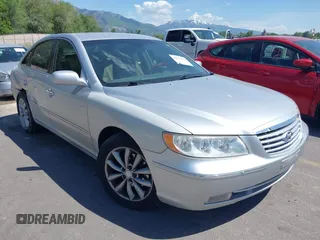 2007 Hyundai Azera SE z VIN KMHFC46F17A199984, wystawiony jako IAAI lot #42357676 z przebiegiem 215 196 mil mil oraz . Historia ofert i sprzedaży dostępna na DreamBid. Obrazek 1.
