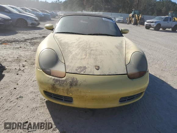 1998 Porsche Boxster z VIN WP0CA2982WU623104, wystawiony jako Copart lot #83398714 z przebiegiem Nie podano mil oraz Czysty tytuł • Clean title. Historia ofert i sprzedaży dostępna na DreamBid. Obrazek 5.