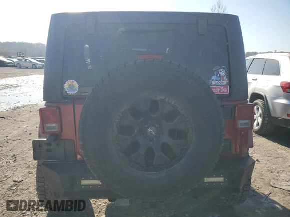 2012 Jeep Wrangler Unlimited Rubicon with VIN 1C4HJWFG4CL114089, listed as a Copart auction lot 49436495 with 189,079 mi miles and Salvage title. Bid and sale history available at DreamBid. Image 6.