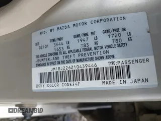 2001 Mazda Protege LX z VIN JM1BJ226210439446, wystawiony jako IAAI lot #42336976 z przebiegiem 155 990 mil mil oraz . Historia ofert i sprzedaży dostępna na DreamBid. Obrazek 9.
