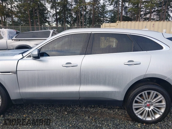 2019 Jaguar F-Pace 30t Portfolio z VIN SADCN2GX3KA353203, wystawiony jako IAAI lot #40967088 z przebiegiem 51 620 mil mil oraz . Historia ofert i sprzedaży dostępna na DreamBid. Obrazek 15.