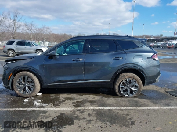 2023 Kia Sportage SX-Prestige with VIN KNDPXCAG5P7038476, listed as a IAAI auction lot 41532005 with 14,151 mi miles and . Bid and sale history available at DreamBid. Image 14.