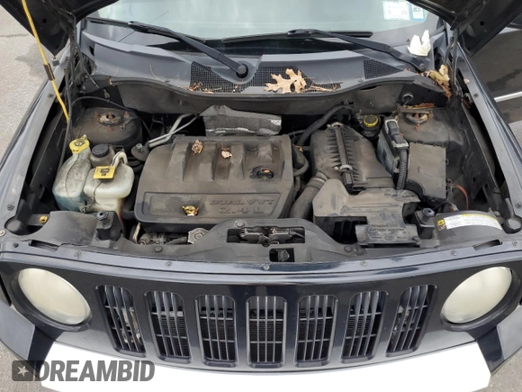 2010 Jeep Patriot Limited with VIN 1J4NF4GB0AD511652, listed as a Copart auction lot 82161234 with 173,164 mi miles and Clean Title. Bid and sale history available at carsss.com. Image 12.