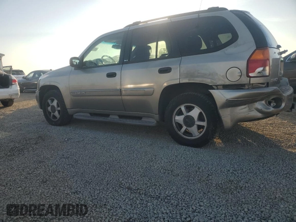 2002 GMC Envoy SLT with VIN 1GKDS13S922287249, listed as a Copart auction lot 88049875 with 157,485 mi miles and Salvage Title. Bid and sale history available at carsss.com. Image 2.