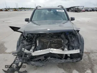 2015 Mercedes-Benz GLK 350 with VIN WDCGG5HB4FG441590, listed as a Copart auction lot 59822584 with 124,186 mi miles and Salvage Title. Bid and sale history available at DreamBid. Image 5.