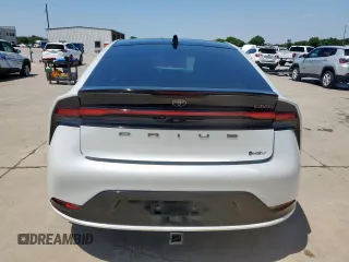 2024 Toyota Prius LE z VIN JTDACAAUXR3022411, wystawiony jako Copart lot #58263865 z przebiegiem 12 783 mil mil oraz Szkoda całkowita • Salvage title. Historia ofert i sprzedaży dostępna na DreamBid. Obrazek 6.