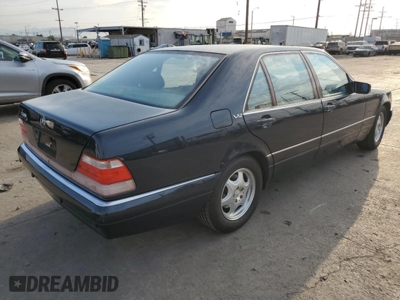 1999 Mercedes-Benz S with VIN WDBGA57G5XA428158, listed as a Copart auction lot 65543515 with 65,698 mi miles and Salvage title. Bid and sale history available at DreamBid. Image 3.
