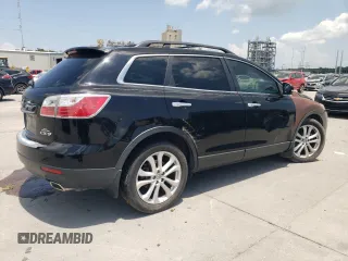 2012 Mazda CX-9 Grand Touring with VIN JM3TB2DA4C0361023, listed as a Copart auction lot 63839005 with 140,784 mi miles and Salvage title. Bid and sale history available at DreamBid. Image 3.