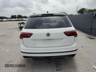 2021 Volkswagen Tiguan SE z VIN 3VV3B7AX9MM133615, wystawiony jako Copart lot #59542955 z przebiegiem 69 946 mil mil oraz Czysty tytuł • Clean title. Historia ofert i sprzedaży dostępna na DreamBid. Obrazek 6.