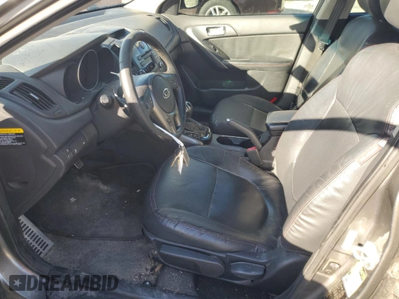 2012 Kia Forte SX с VIN KNAFW5A3XC5518104, выставлен на аукционе Copart как лот 42579785 с пробегом 130 111 миль миль и Списание • Salvage title. История ставок и продаж доступна на DreamBid. Изображение 7.