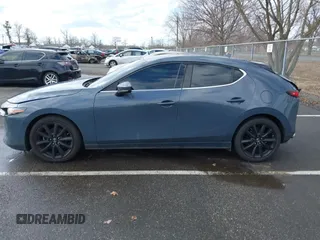 2020 Mazda 3 Premium z VIN JM1BPBNM9L1174949, wystawiony jako IAAI lot #41728868 z przebiegiem 68 968 mil mil oraz . Historia ofert i sprzedaży dostępna na DreamBid. Obrazek 15.