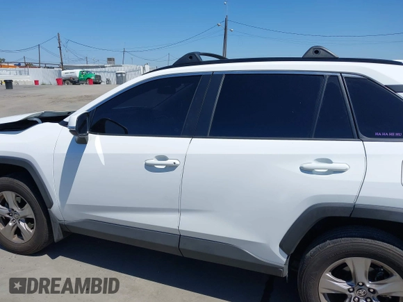 2022 Toyota RAV4 XLE with VIN 2T3W1RFV4NW233025, listed as a IAAI auction lot 42238717 with 39,156 mi miles and . Bid and sale history available at DreamBid. Image 14.