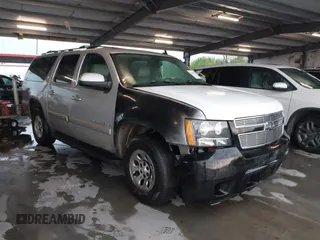 2007 Chevrolet Suburban LS with VIN 1GNFC16067J219667, listed as a IAAI auction lot 41900333 with 1 mi miles. Bid and sale history available at carsss.com. Image 1.