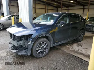 2018 Mazda CX-5 Grand Touring with VIN JM3KFBDM0J1434227, listed as a Copart auction lot 42093653 with 64,750 mi miles and . Bid and sale history available at DreamBid. Image 1.