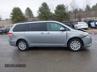 2012 Toyota Sienna LE with VIN 5TDJK3DCXCS040253, listed as a IAAI auction lot 41957623 with 164,780 mi miles. Bid and sale history available at carsss.com. Image 13.