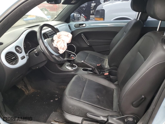2012 Volkswagen Beetle 2.5L w/Sun/Sound/Nav PZEV with VIN 3VWJP7AT9CM618529, listed as a Copart auction lot 84940494 with 102,838 mi miles and Salvage Title. Bid and sale history available at carsss.com. Image 7.