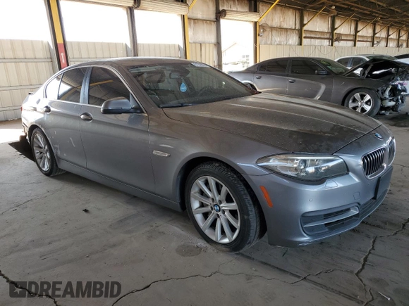2014 BMW 5 Series 535d with VIN WBAXA5C50ED690264, listed as a Copart auction lot 51329235 with 123,946 mi miles and Salvage Title. Bid and sale history available at carsss.com. Image 4.