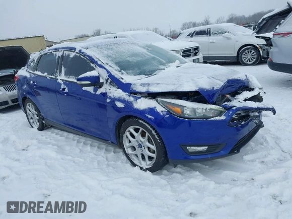 2015 Ford Focus SE with VIN 1FADP3F23FL361274, listed as a IAAI auction lot 41292796 with 102,741 mi miles. Bid and sale history available at carsss.com. Image 1.