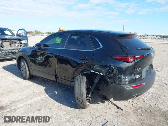 2023 Mazda CX-30 S Select with VIN 3MVDMBBM9PM508958, listed as a IAAI auction lot 42009029 with 21,219 mi miles and . Bid and sale history available at DreamBid. Image 3.