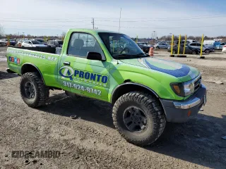 1999 Toyota Tacoma with VIN 4TAPM62N2XZ491929, listed as a Copart auction lot 43827365 with 256,146 mi miles and Clean Title. Bid and sale history available at DreamBid. Image 4.