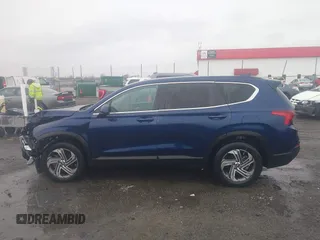 2022 Hyundai Santa Fe SE z VIN 5NMS14AJ8NH406846, wystawiony jako IAAI lot #41588202 z przebiegiem 34 006 mil mil oraz . Historia ofert i sprzedaży dostępna na DreamBid. Obrazek 14.