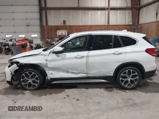 2021 BMW X1 xDrive28i with VIN WBXJG9C04M5T82884, listed as a IAAI auction lot 42242890 with 24,647 mi miles and . Bid and sale history available at DreamBid. Image 14.