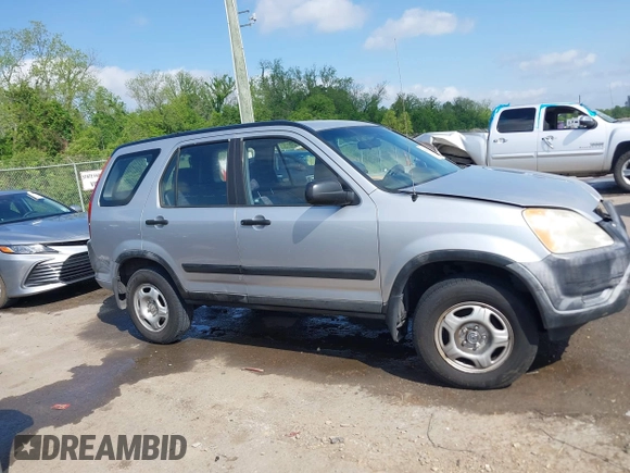 2003 Honda CR-V LX z VIN JHLRD68493C008030, wystawiony jako IAAI lot #42034191 z przebiegiem 290 596 mil mil oraz . Historia ofert i sprzedaży dostępna na DreamBid. Obrazek 13.