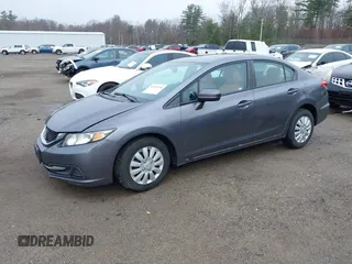 2014 Honda Civic Sedan LX with VIN 2HGFB2F53EH541941, listed as a IAAI auction lot 42033294 with 104,006 mi miles. Bid and sale history available at carsss.com. Image 2.