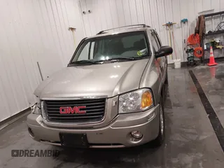 2003 GMC Envoy SLT with VIN 1GKDT13S932395367, listed as a IAAI auction lot 41544810 with 142,012 mi miles. Bid and sale history available at carsss.com. Image 11.