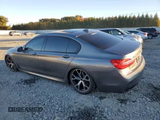 2017 BMW 7 Series with VIN WBA7F2C32HG422866, listed as a Copart auction lot 76177184 with 146,565 mi miles and Salvage Title. Bid and sale history available at DreamBid. Image 2.