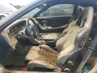1997 Toyota Supra с VIN JT2DE82A0V0037380, выставлен на аукционе Copart как лот 74052604 с пробегом Не указан миль и Списание • Salvage title. История ставок и продаж доступна на DreamBid. Изображение 7.