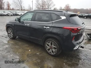 2021 Kia Seltos SX with VIN KNDETCA29M7217543, listed as a Copart auction lot 82009644 with 56,270 mi miles and Salvage Title. Bid and sale history available at carsss.com. Image 2.