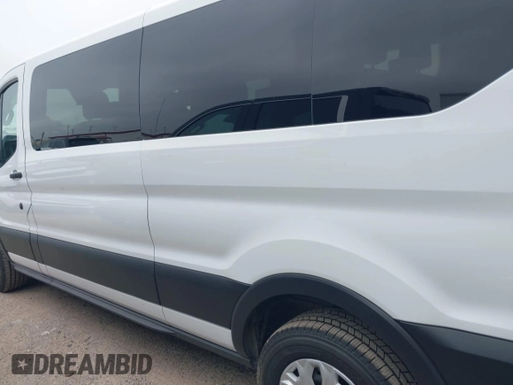 2023 Ford Transit Passenger XL with VIN 1FBAX2Y81PKA49071, listed as a IAAI auction lot 42309750 with 73,946 mi miles and . Bid and sale history available at DreamBid. Image 14.