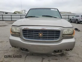 1999 Cadillac Escalade z VIN 1GYEK13R5XR415895, wystawiony jako Copart lot #87112044 z przebiegiem 141 662 mil mil oraz Tytuł czysty. Historia ofert i sprzedaży dostępna na DreamBid. Obrazek 5.