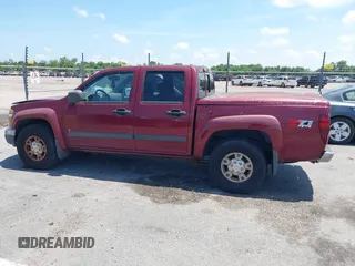 2007 Chevrolet Colorado 1LT z VIN 1GCDT13E278223075, wystawiony jako IAAI lot #42279510 z przebiegiem 133 399 mil mil oraz . Historia ofert i sprzedaży dostępna na DreamBid. Obrazek 14.